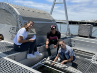 Students get hands-on aquaculture experience on a floating upwelling system (FLUPSY) in San Diego Bay. Photo Courtesy of Theresa Talley  