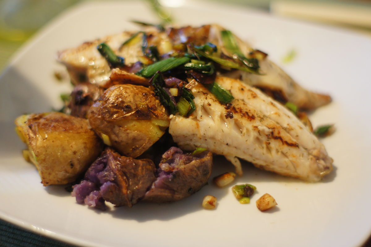 Alexandra Guerson/flickr perch fillets with rainbow potatoes and green onion garnish