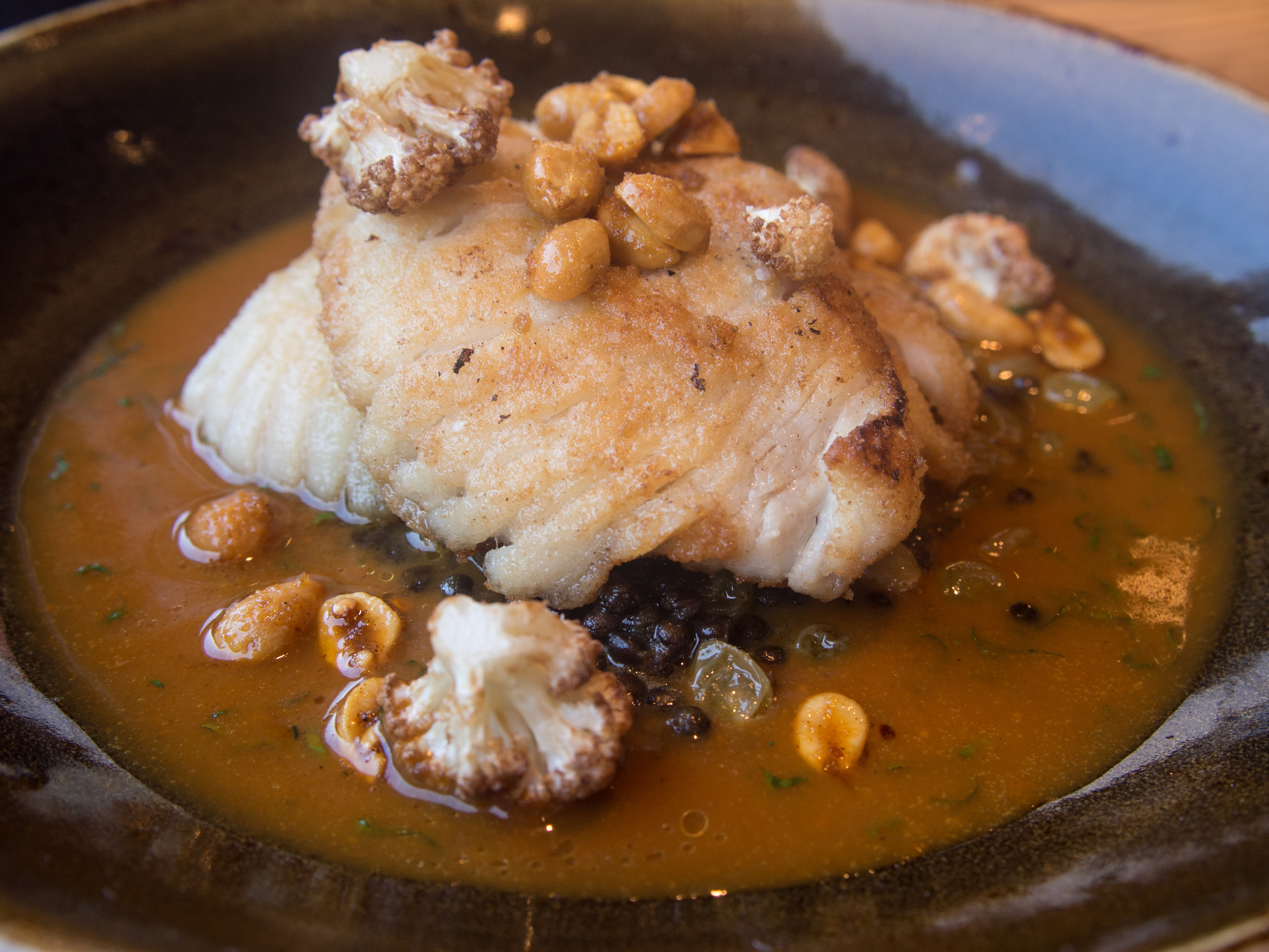 Edsel Little/flickr skate wing with lentils, cauliflower, peanuts, and curry