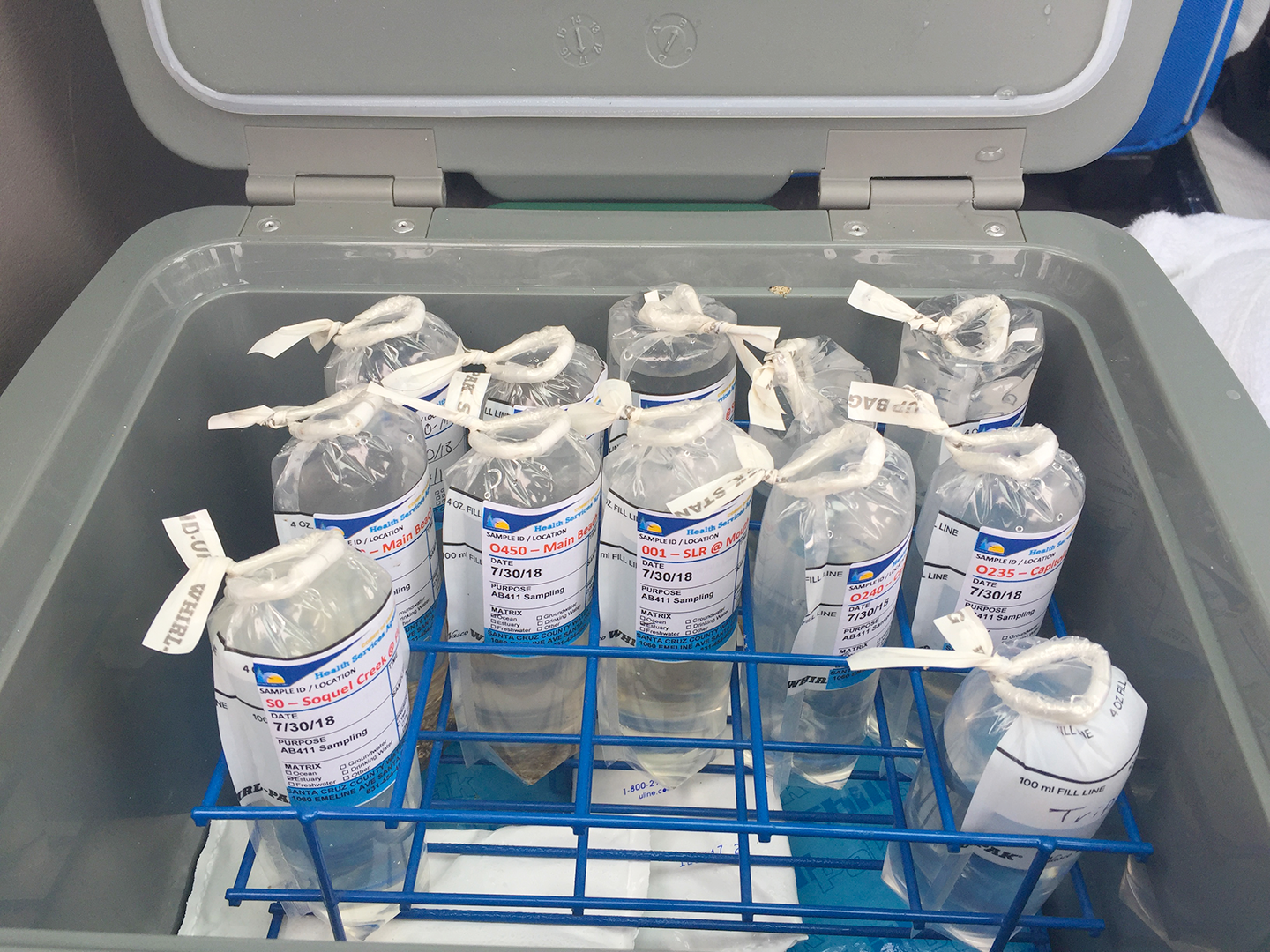 The morning's haul of water samples. These samples and more are collected at least weekly during summer months. Credit: Lark Starkey