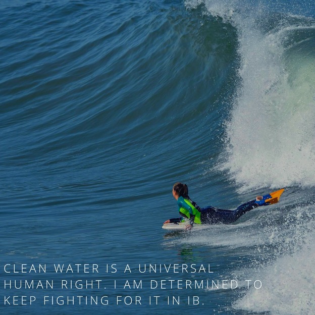 body boarder  on wave. Text: clean water is a universal human right. i am determined to keep fighting for it in IB