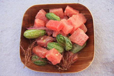A cold watermelon salad garnished with farmed red "ogo" seaweed. Credit: C. Johnson