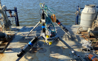 The team prepares to deploy their aquatic eddy covariance (ARC) benthic flux system in the Bay-Delta.