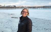 Laura Engeman on a beach