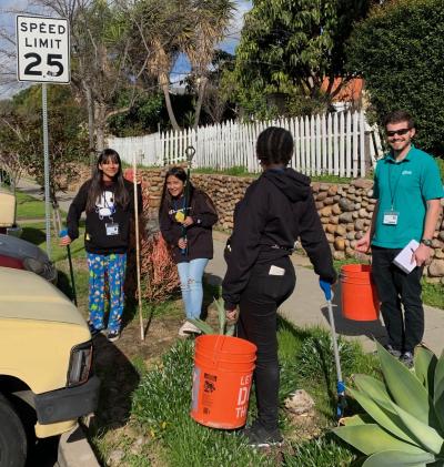 Students conducting street trash survey
