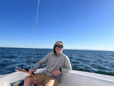 Michael Wells on a boat