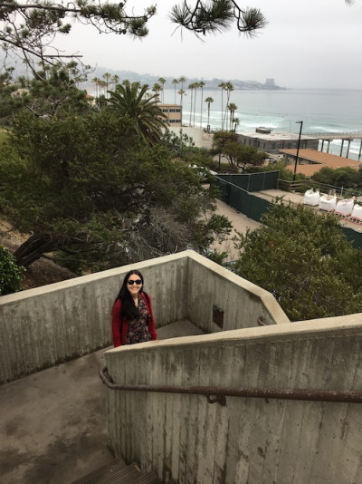 Camila Pauda standing in an outside staircase