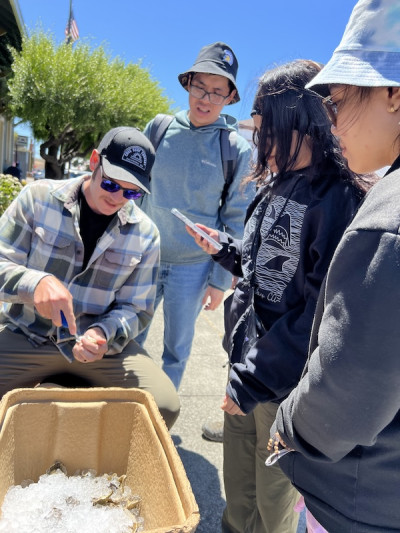 Noah Kolander showing off Hog Island oysters