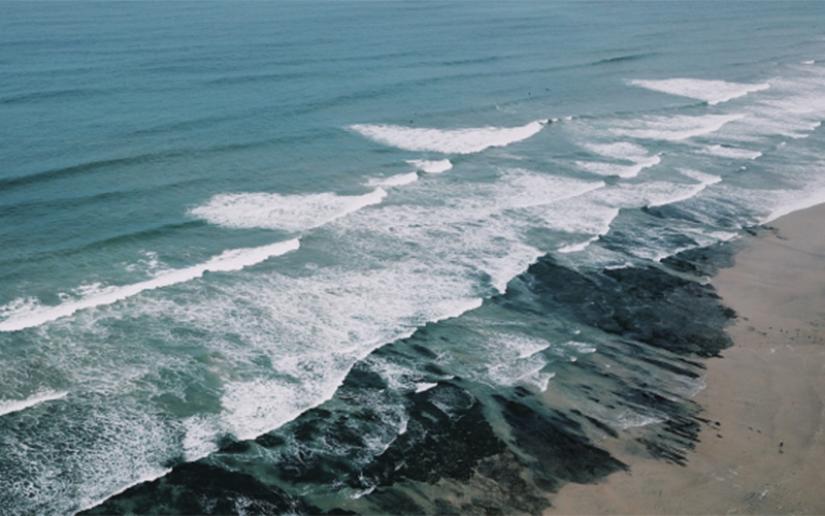 Rip currents visible in waves off Encinitas, Calif.