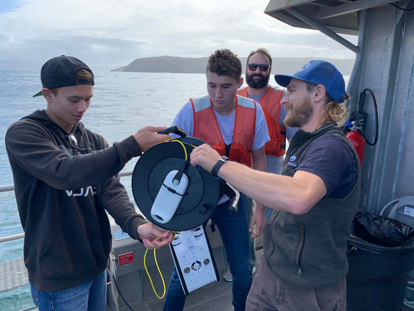 California Sea Grant state fellow Pike Spector orients students to the finer points of tether management aboard the r/v Shearwaters