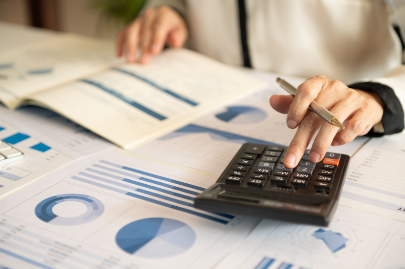 person calculating finances