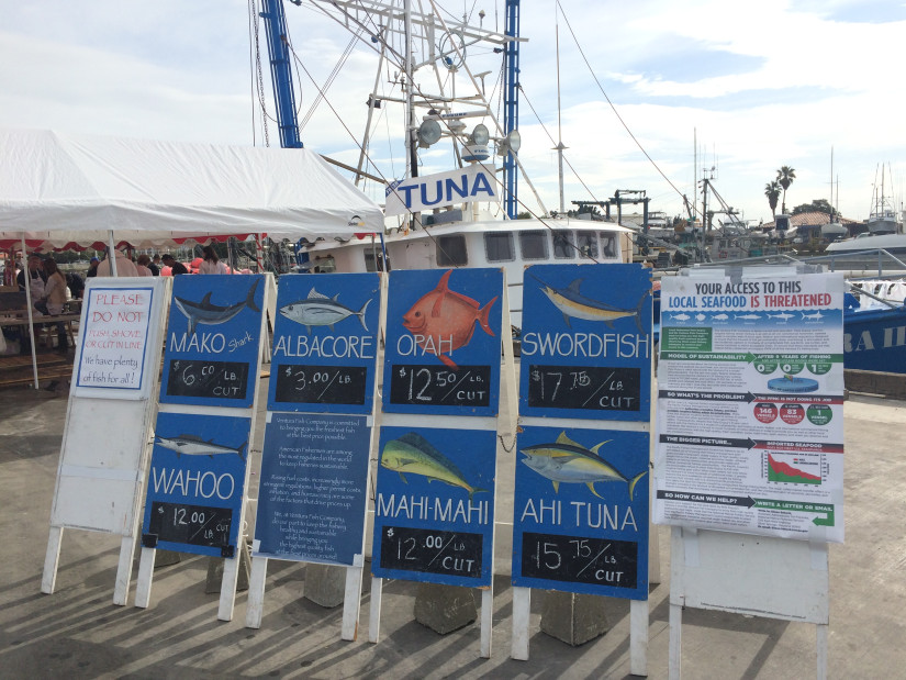 seafood product signs with pricing 