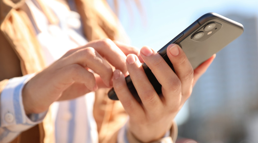 hands holding smartphone