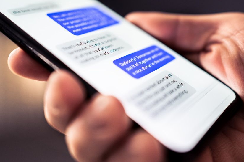 close up of text messages on smart phone