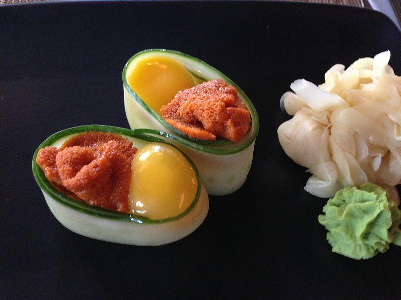 Uni with quail egg sushi.