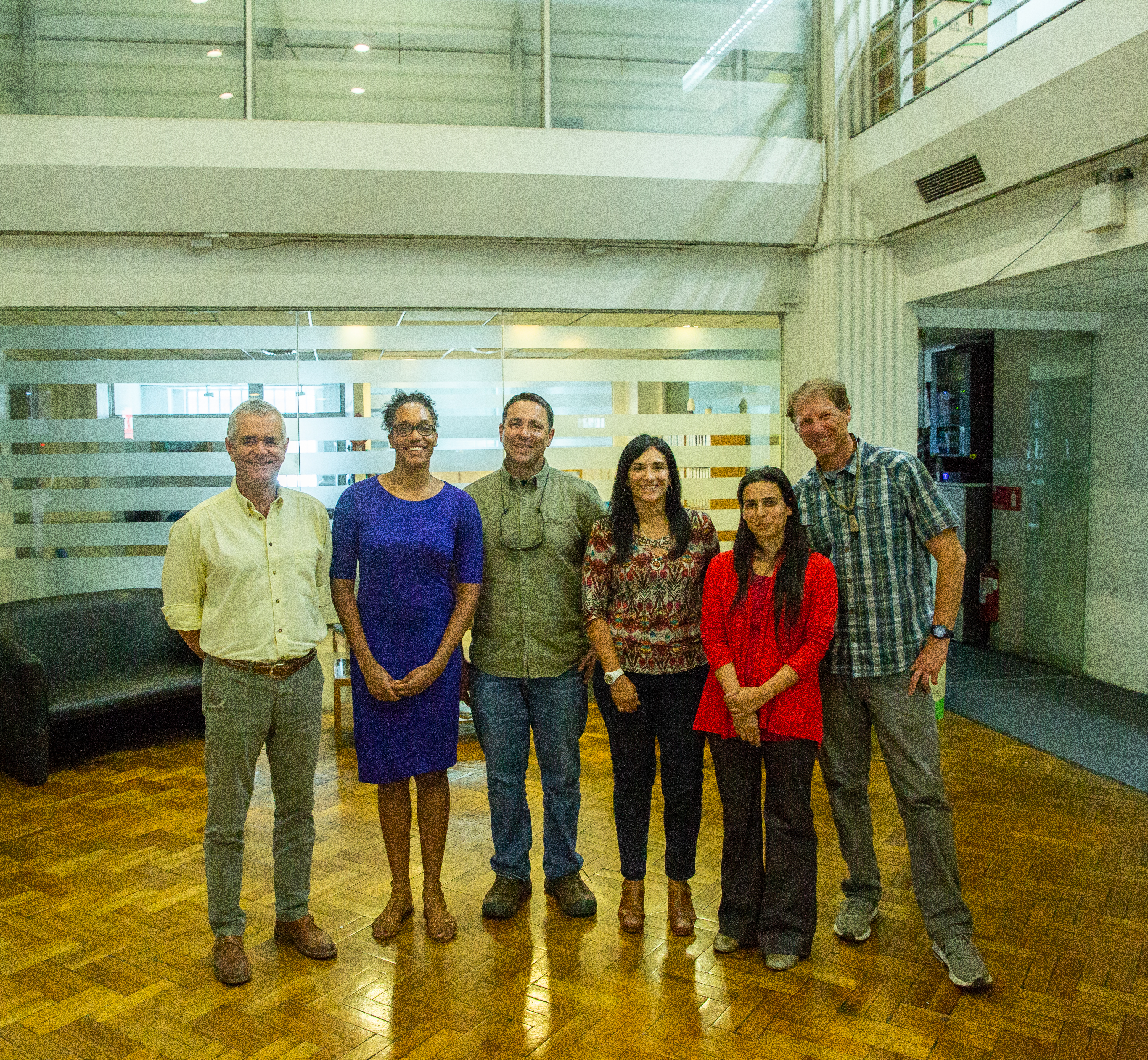 Alexis Jackson standing with a group of other researchers